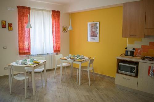 Kuchyň nebo kuchyňský kout v ubytování B&B Fleurs