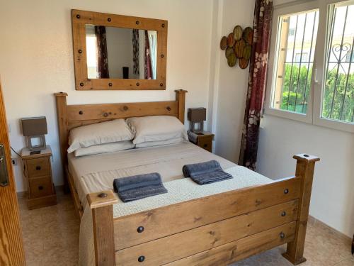 Llit o llits en una habitació de 17 Vistamar Playa Flamenca