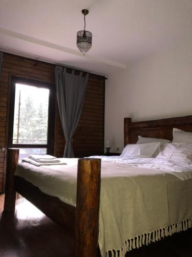 Postel nebo postele na pokoji v ubytování Cabana Zimbru Transfagarasan