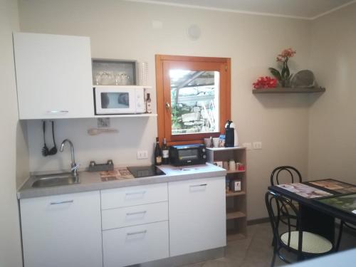 Cuisine ou kitchenette dans l'établissement Casa Amélie Bellagio