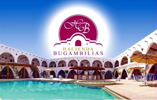 a building with a sign that reads hazratbal bujadollah at Hotel Hacienda Bugambilias in La Paz