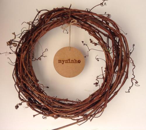 a twig wreath with ayrina written on it at myninho in Vila Nova de Gaia