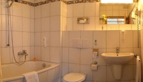 Ein Badezimmer in der Unterkunft Hotel Stadt Naumburg