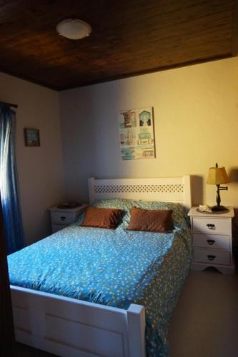 מיטה או מיטות בחדר ב-Portugal House