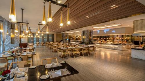 ห้องอาหารหรือที่รับประทานอาหารของ Grand Metropark Hotel Chongqing