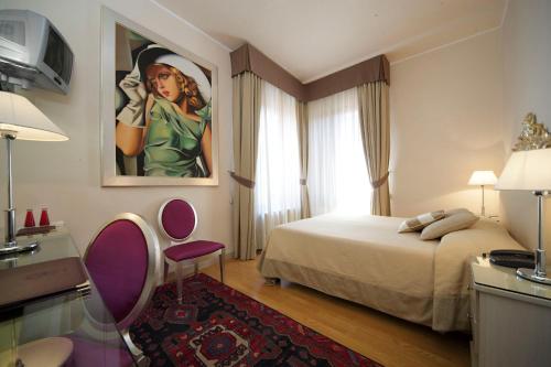 Ένα ή περισσότερα κρεβάτια σε δωμάτιο στο Hotel Liassidi Palace