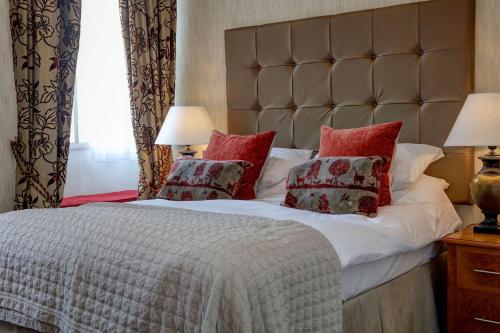 Ένα ή περισσότερα κρεβάτια σε δωμάτιο στο The George Hotel