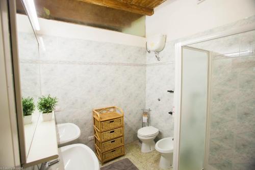Ett badrum på Sassari-In