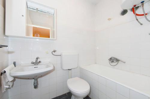 Phòng tắm tại Apartmani Darinka