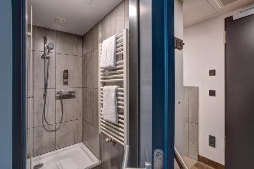 Koupelna v ubytování MEININGER Hotel München Olympiapark
