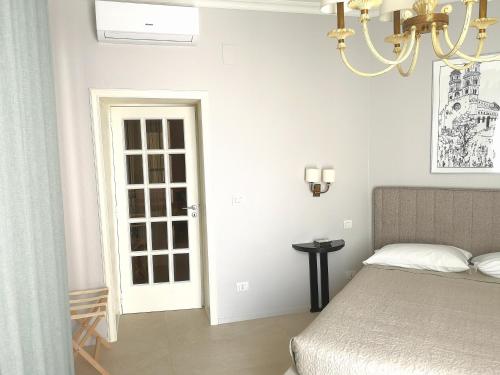 Ένα ή περισσότερα κρεβάτια σε δωμάτιο στο Vacanze Murgiane