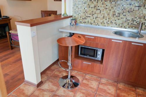 Kuhinja ili čajna kuhinja u objektu Modern Apartment with Panoramic View near Metro 23August