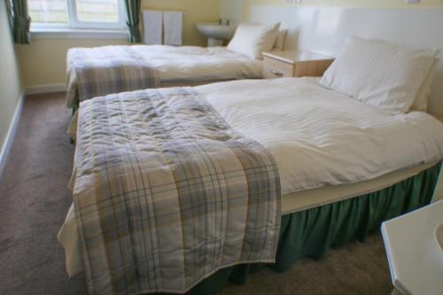 Postel nebo postele na pokoji v ubytování Station Hotel Stonehaven