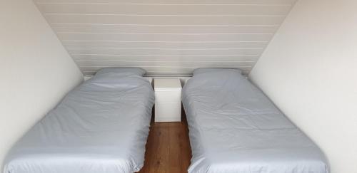 Un ou plusieurs lits dans un hébergement de l'établissement Egmont op zee