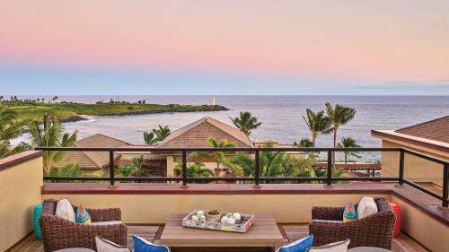 a view of the ocean from the balcony of a resort at Timbers Kauai Ocean Club & Residences in Lihue
