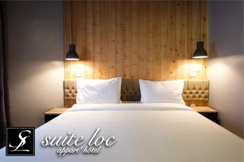 Postel nebo postele na pokoji v ubytování Suite Loc Suite & Spa
