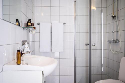 Ванная комната в Frogner House - Nationaltheatret
