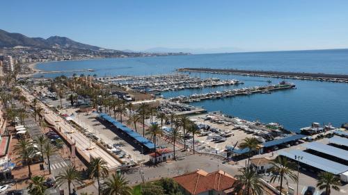 an aerial view of a harbor with a marina at ESTUDIO SOLYPLAYARELAX in Fuengirola