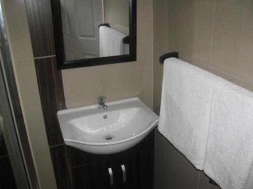 Ванная комната в Bruno Comfort Suites