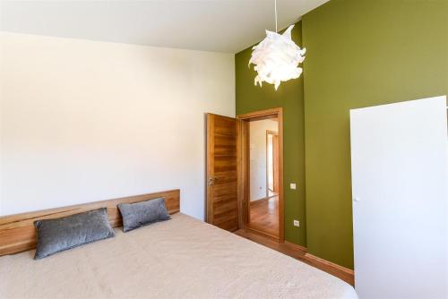 Ліжко або ліжка в номері Atsipūskit