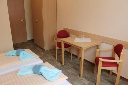 Säng eller sängar i ett rum på Hotel und Campingstell und Zeltplatz an der Talsperre im Harz
