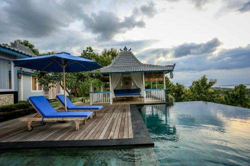 Kolam renang di atau di dekat The Kayu Manis Villa