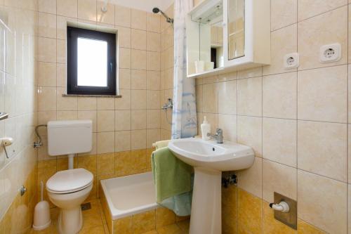 Kúpeľňa v ubytovaní Apartman Sintić