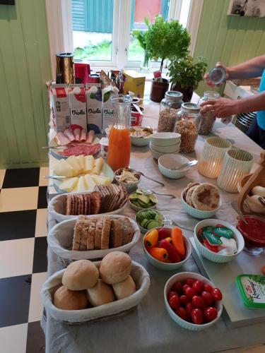 a table with a bunch of food on it at Flatheim in Viksdalen