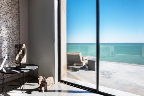 a room with a view of a living room at Palais Rhoul & Spa Dakhla in Dakhla