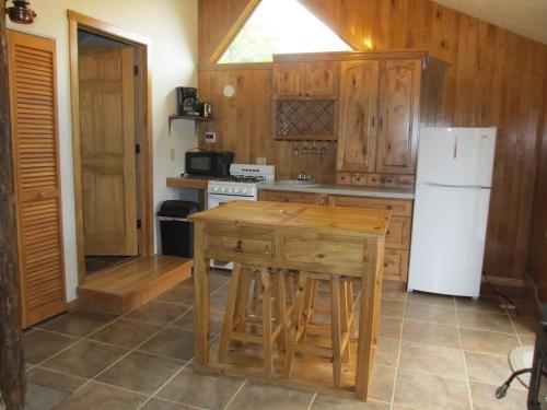 Kuchyň nebo kuchyňský kout v ubytování The Remington Cabin