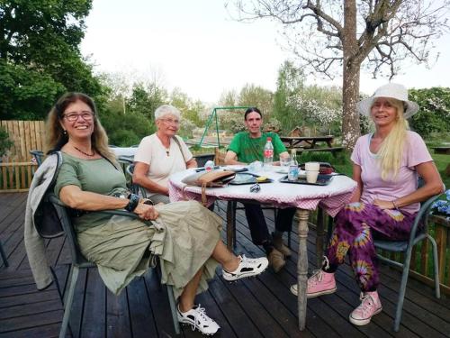a group of people sitting at a table at Stenslid Bottna By St Anna in Söderköping