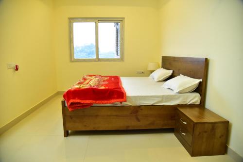 Postel nebo postele na pokoji v ubytování Hotel ALIG INN