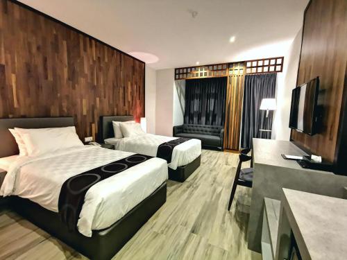 Cama o camas de una habitación en Frame Hotel