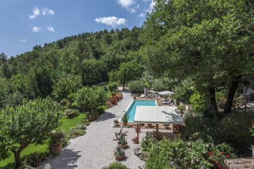 an aerial view of a resort with a swimming pool at Torre del Falco in Spoleto