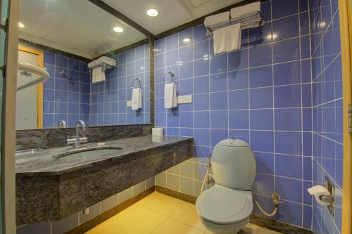 Bilik mandi di Tristar Serviced Apartments