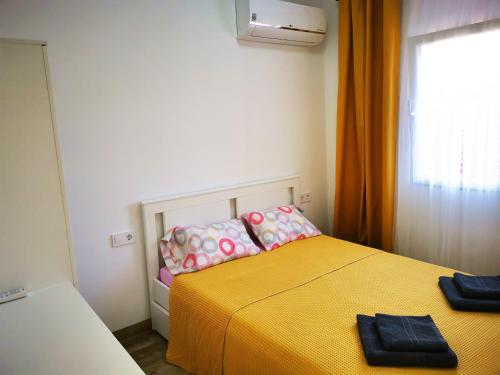 Posteľ alebo postele v izbe v ubytovaní SunnySpainHolidays Apartments