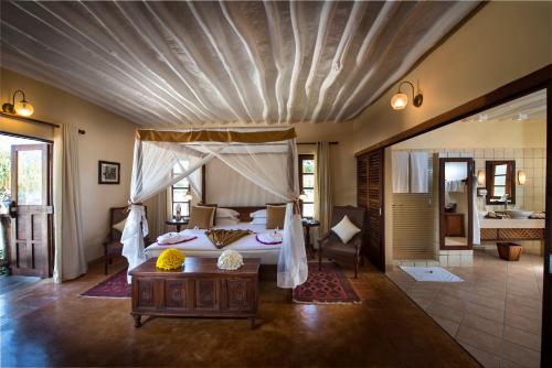 Postel nebo postele na pokoji v ubytování Neptune Pwani Beach Resort & Spa Zanzibar - All Inclusive