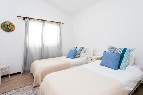 Postel nebo postele na pokoji v ubytování Jill´s dream Villa