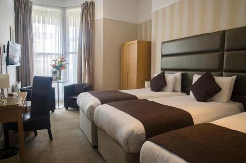 Cama o camas de una habitación en The Brighton Hotel