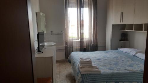 Ein Bett oder Betten in einem Zimmer der Unterkunft Albergo Pensione Ardenza SELF CHECK-IN