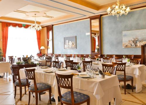 Reštaurácia alebo iné gastronomické zariadenie v ubytovaní Best Western Classic Hotel