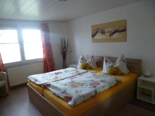 Ένα ή περισσότερα κρεβάτια σε δωμάτιο στο Ferienhaus ANNE