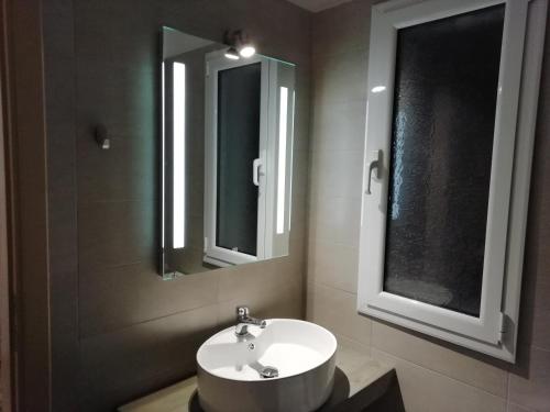 Kylpyhuone majoituspaikassa Spartila Apartments