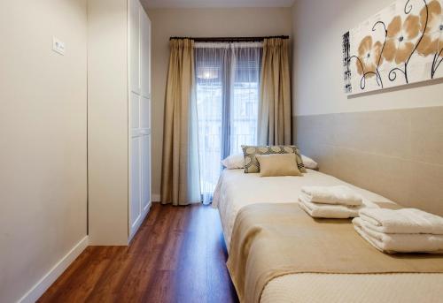 Ένα ή περισσότερα κρεβάτια σε δωμάτιο στο Casa de Bisagra