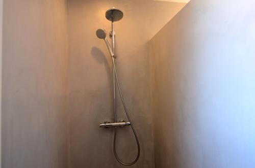 a shower with a shower head on a wall at VILLA DEL GOLF in Pals