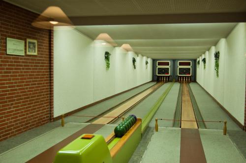 an image of a bowling alley with lanes at Hotel & Restaurant Ernst in Giesen