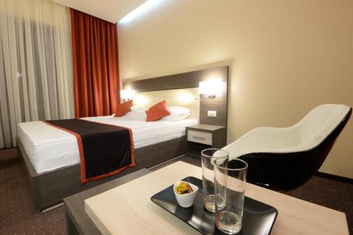 Postel nebo postele na pokoji v ubytování Hotel Galaxy