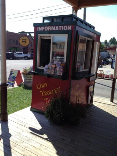 a small kiosk on the side of a street at Irma Hotel in Cody