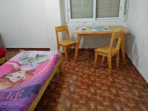 Rúm í herbergi á Monoambiente centro