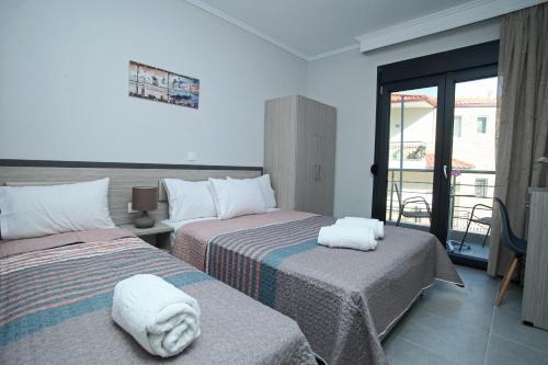 Postel nebo postele na pokoji v ubytování SeaSide House
